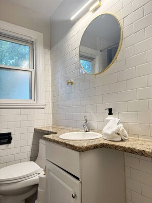 Hair dryer, towels, soap, shampoo
