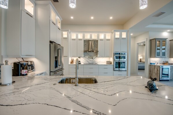 Fridge, microwave, oven, stovetop - Experience Unparalleled Luxury and Serenity at Villa Soulside, Cape Coral, FL (Cape Coral)