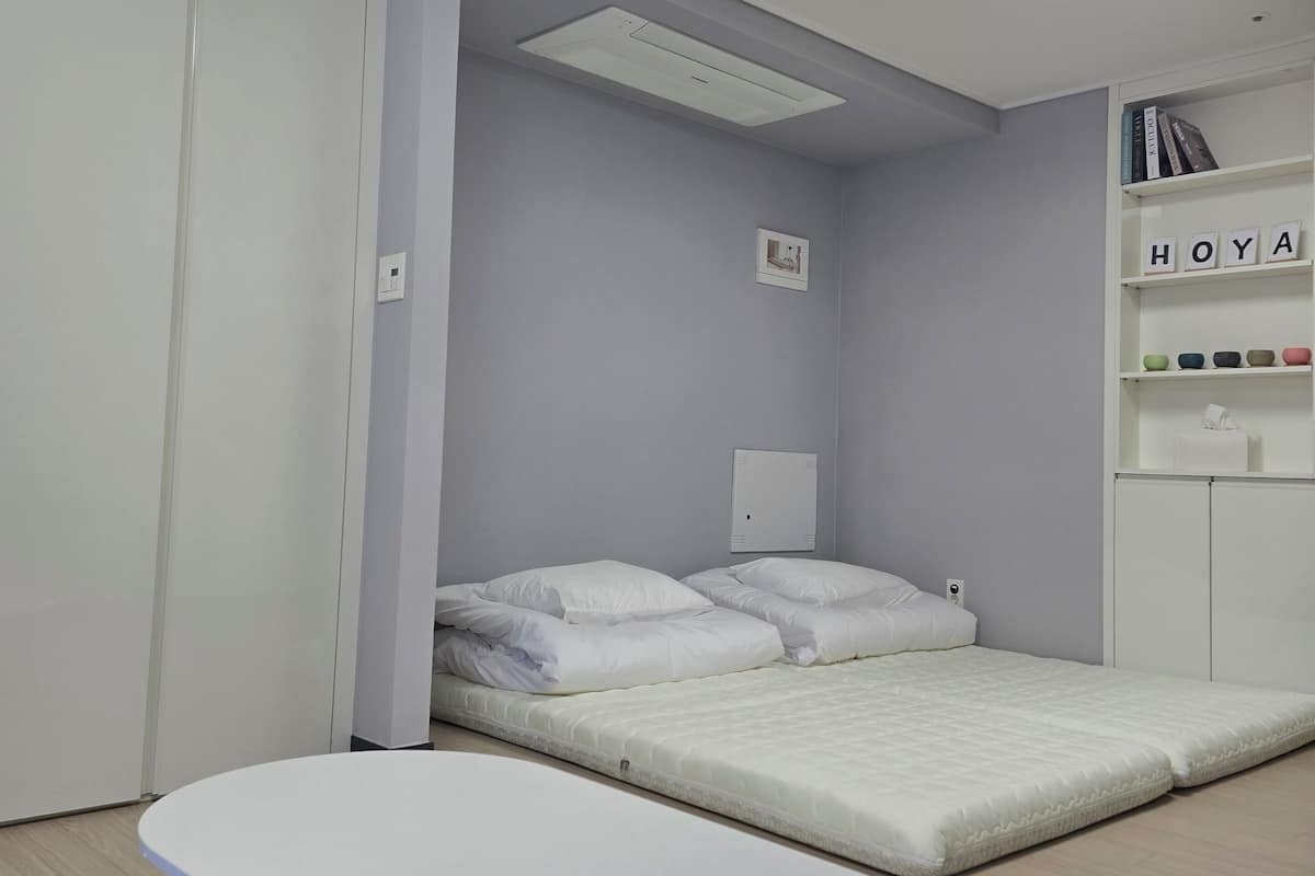 Premium bedding, down duvets, individually decorated