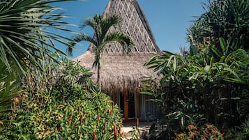 Habitación doble Deluxe, vista al jardín | Terraza o patio