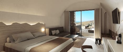 Um quarto espaçoso com uma cama grande, um espaço de estar e vista para o exterior.