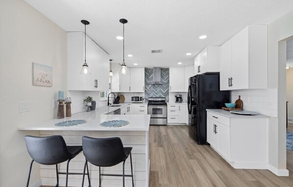 Private kitchen - A family friendly getaway in Englewood with a pool and close to the beach! (Englewood)