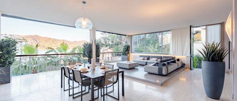 Family Apartment, 3 Bedrooms, 2 Bathrooms (Sea View Terrace In Santa Margherita) | Living area | 21-inch flat-screen TV with cable channels