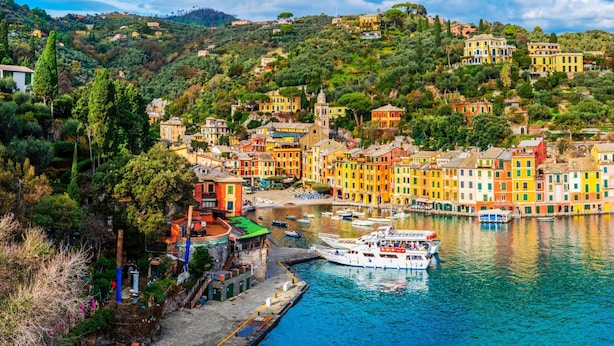 A coastal town with colorful buildings, a marina, and boats. - Sea View Apartment Next To Acquarium (Genoa)