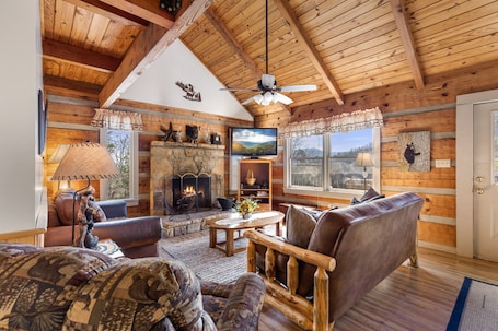 Comfort Cabin, 2 Bedrooms, Non Smoking, Hot Tub | Living room | 50-inch Smart TV with digital channels, fireplace