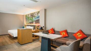 Premium Studio Suite, 1 King Bed, City View | Premium bedding, down comforters, pillowtop beds, minibar