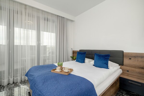 Desk, laptop workspace, free WiFi, bed sheets