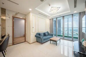 Svit Presidential - 3 sovrum - tillgång till Club Lounge - utsikt mot staden | Egyptiska bomullslakan, sängtillbehör av högsta kvalitet och duntäcken