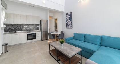 Thalassa- Two-Bedroom Duplex with Garden
