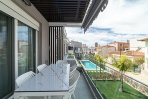 Outdoor dining - Anastasia Residential Complex-Two-Bedroom Loft with Pool Access (Kavala)