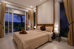 Habitación Deluxe | Sistema de insonorización, tabla de planchar con plancha, wifi gratis