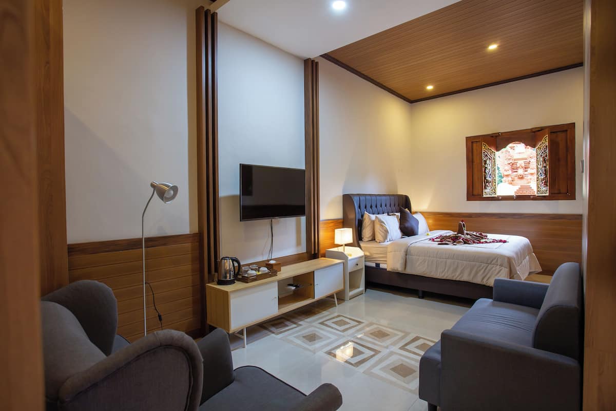 Suíte superluxo | Quartos à prova de som, ferros/tábuas de passar roupa, Wi-Fi de cortesia