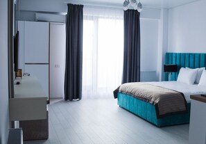 1 bedroom, blackout drapes, soundproofing, iron/ironing board