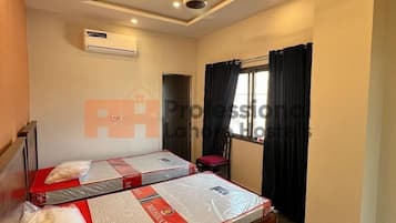 Habitación doble ejecutiva de uso individual, baño privado, vista a la ciudad | Sábanas de algodón egipcio y ropa de cama de alta calidad