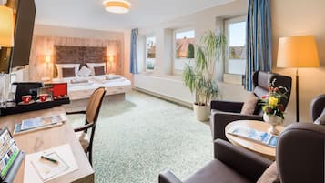 Deluxe Studio Suite | 1 bedroom, premium bedding, in-room safe, individually furnished