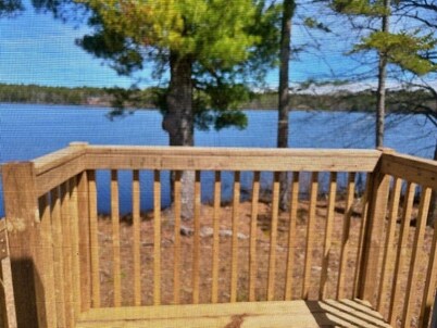      Private, Peaceful, lakefront, fully furnished 2-bedroom Mini-home . 
