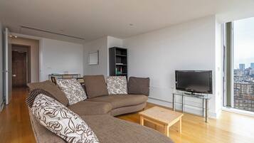 Apartment (2 Bedrooms) | Living area | 32-inch Smart TV with digital channels, TV