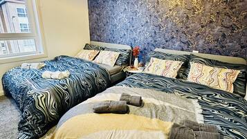 Hair dryer, towels, soap, shampoo