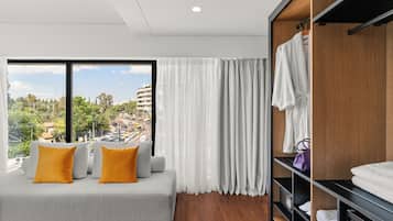 Suite Junior | Minibar con snack e bevande gratuite, una cassaforte in camera