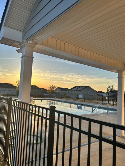 5 bedroom spacious home, with charcoal grill and seating. Peaceful neighborhood.