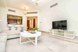 TV - Bespoke Holiday Homes - Palm Jumeirah- 2 Bedroom with Gym, Beach & Pool Access, (The Palm Jumeirah)