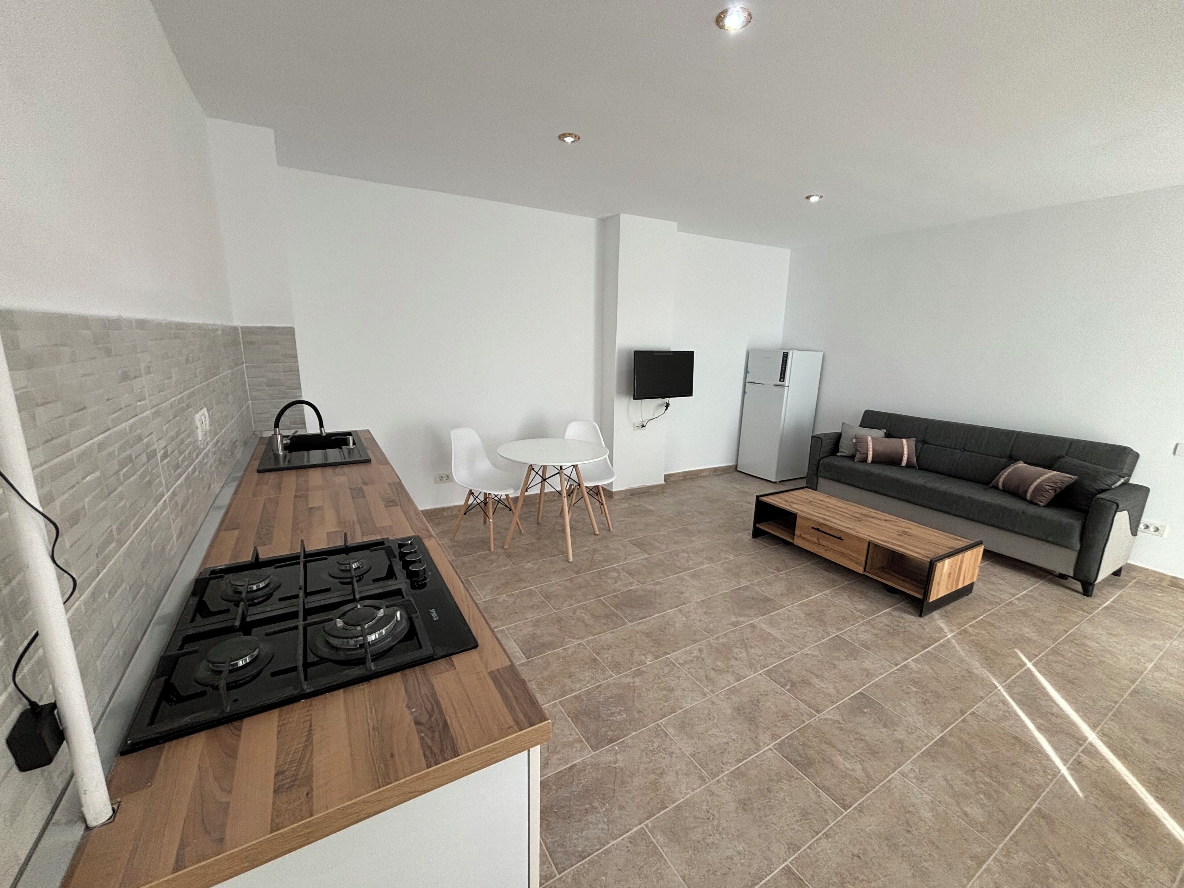 Departamento urbano | Área de sala de estar | Televisión de pantalla plana 