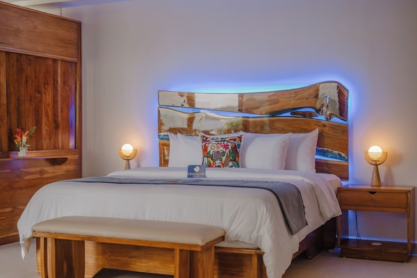 Suite júnior, vistes a l'oceà | 1 dormitori, llençols de cotó egipci i roba de llit d'alta qualitat