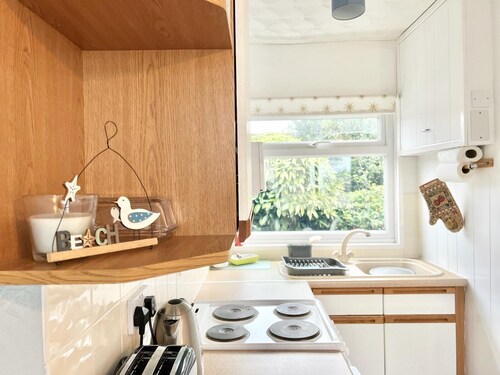 Seaside Chalet near Bracelet Bay - Pass The Keys