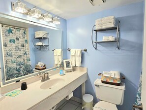 Hair dryer, towels, soap, shampoo