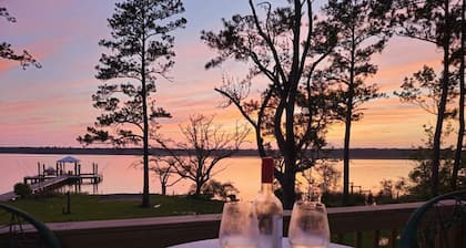 Secluded waterfront fishing cabin, boat dock, pier, sunsets, boat to beach