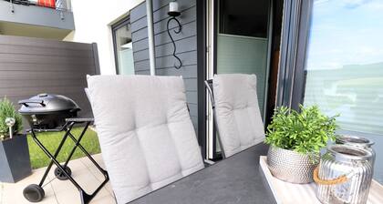 Ferienwohnung Roberta – Auszeit am See. Modern. Terrasse.