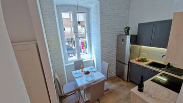 Comfort-studiolejlighed - 1 queensize-seng med sovesofa - ikke-ryger - byudsigt | Privat køkken | Køleskab/fryser i fuld størrelse, mikrobølgeovn, kogeplade