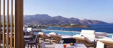 Indoor pool, seasonal outdoor pool, pool umbrellas, sun loungers
