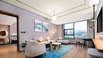 Deluxe Suite, 1 King Bed | Living area