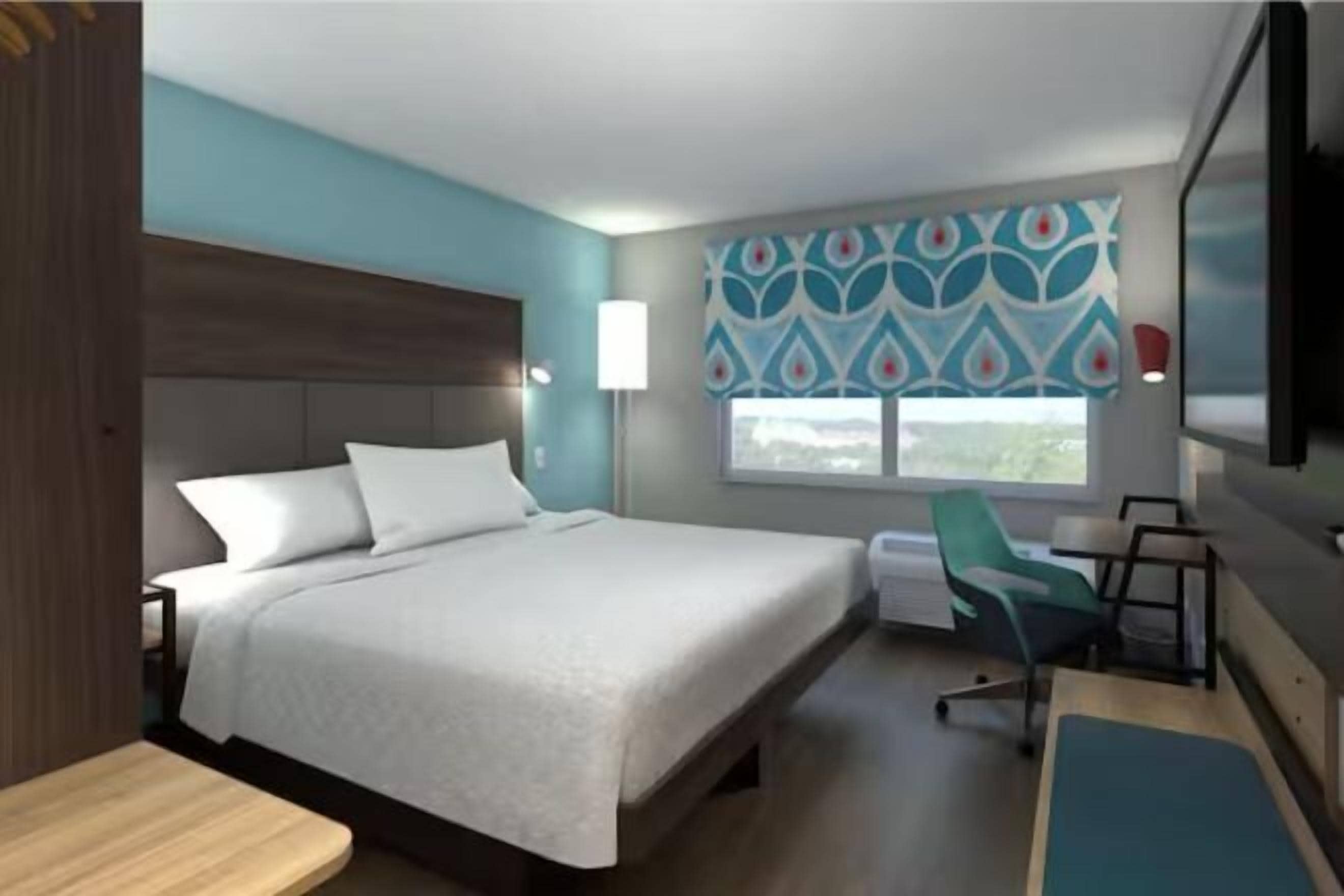 Een bureau, een laptopwerkplek, een strijkplank/strijkijzer, gratis wifi