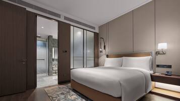 Suite Premium, 1 très grand lit, vue mer | Couette en duvet d'oie, minibar, coffres-forts dans les chambres