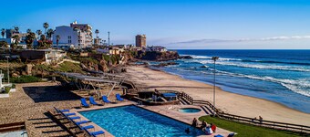 Dog-friendly retreat with ocean-view rooftop deck, pool, hot tub, & kitchen