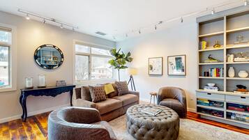 TV, fireplace, books