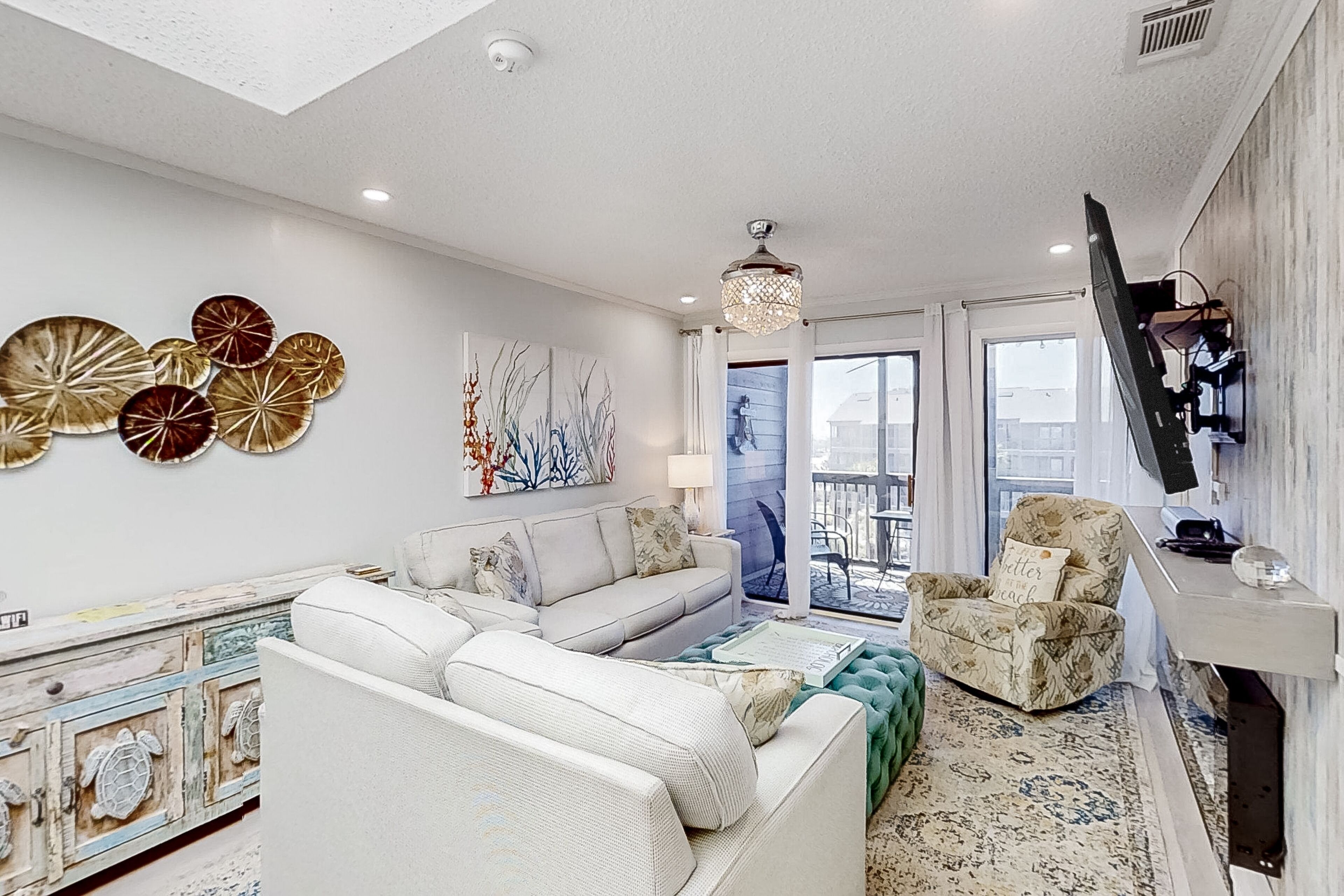 Charming condo near the water with pool, hot tub, balcony, fireplace, & W/D