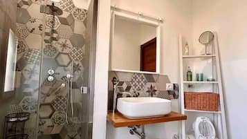 Shower, eco-friendly toiletries, hair dryer, bidet