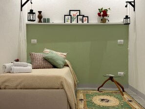 2 bedrooms, desk, iron/ironing board, travel cot