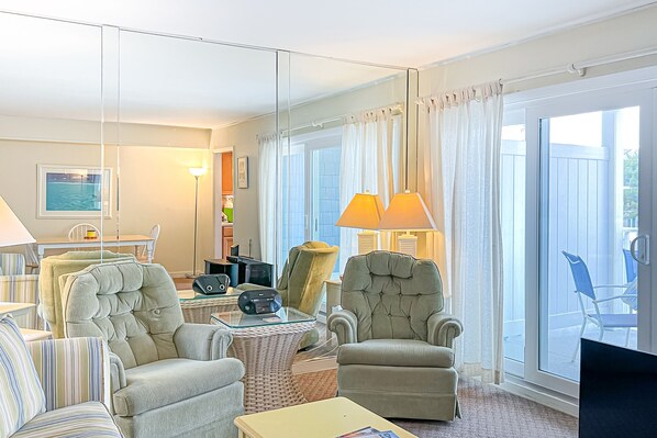 TV, DVD player - 2nd-floor Sunspot condo steps from beach with balcony, outdoor shower, W/D, & AC (Dewey Beach)