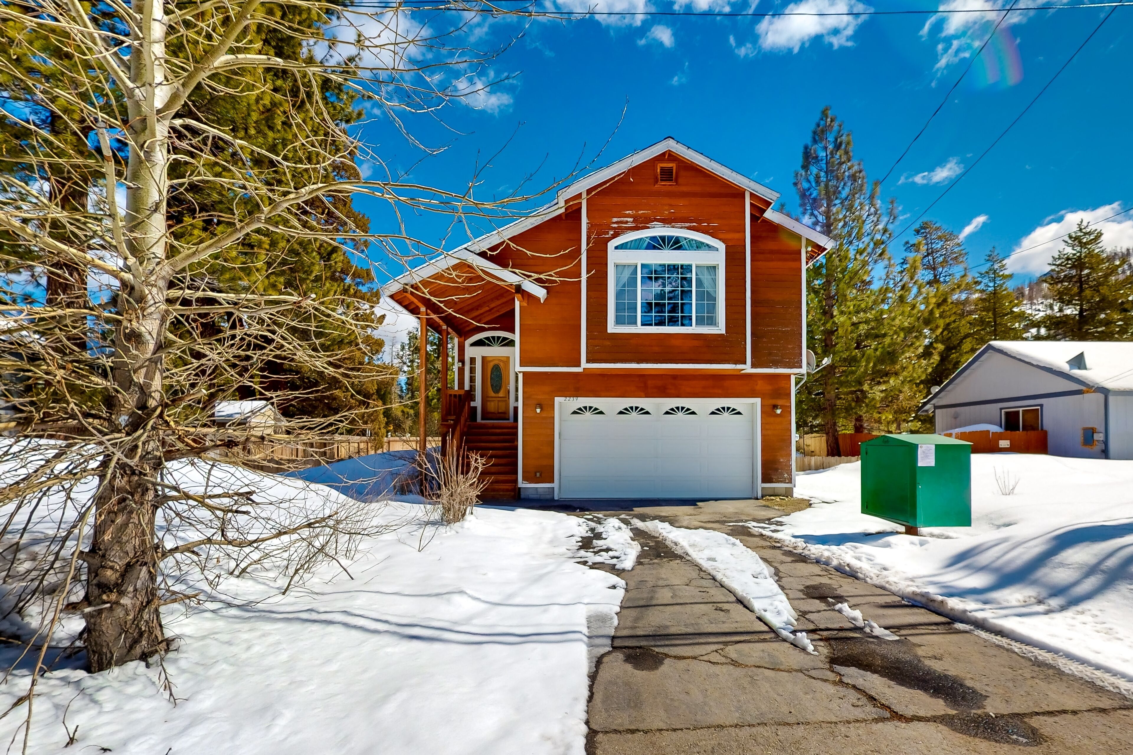 Dog-friendly two-story home with a washer/dryer, deck, game room