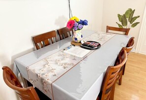 Dining - Spacious and cozy ground-level 3-bed suite. Walk to Metrotown Mall and Skytrain! (Burnaby)