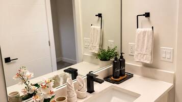 Hair dryer, towels, soap, shampoo