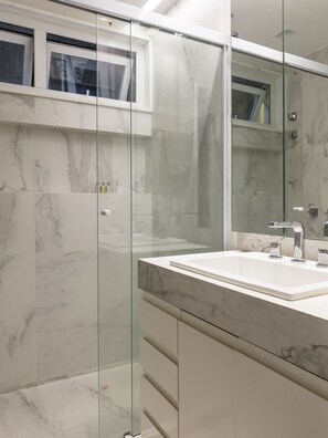 Shower, hair dryer, towels, soap