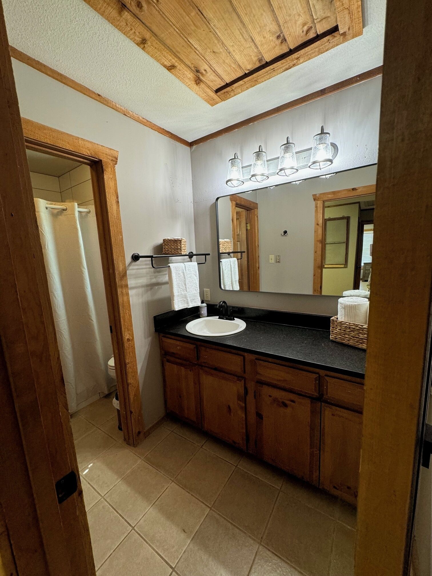 Shower, hair dryer, towels, toilet paper
