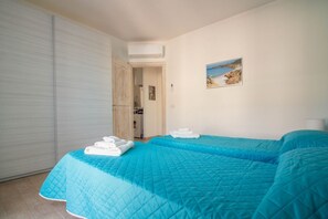 2 habitaciones, tabla de planchar con plancha, wifi y ropa de cama 