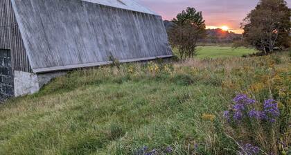 Private tent camping along the Salmon River on 165-acre Farm.