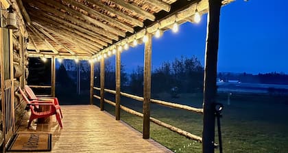 Come escape to our historic log cabin alongside a beautiful creek in North Idaho